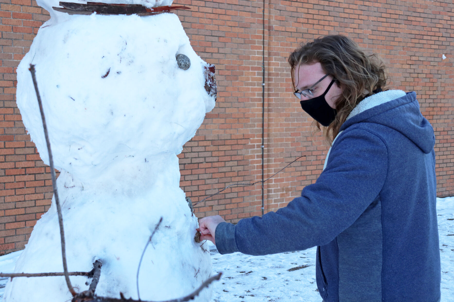 Photos: UTA students take advantage of the snowfall blanketing campus